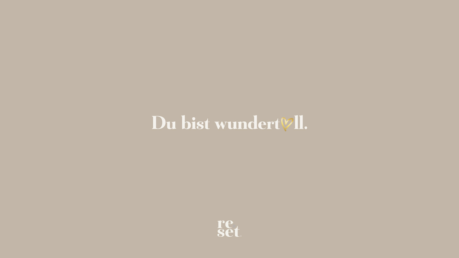 Beiges Wallpaper mit dem Text 'Du bist wundertoll.' und einem goldenem Herzsymbol im Wort 'wundertoll', darunter das Wort 'reset' in kleiner Schrift